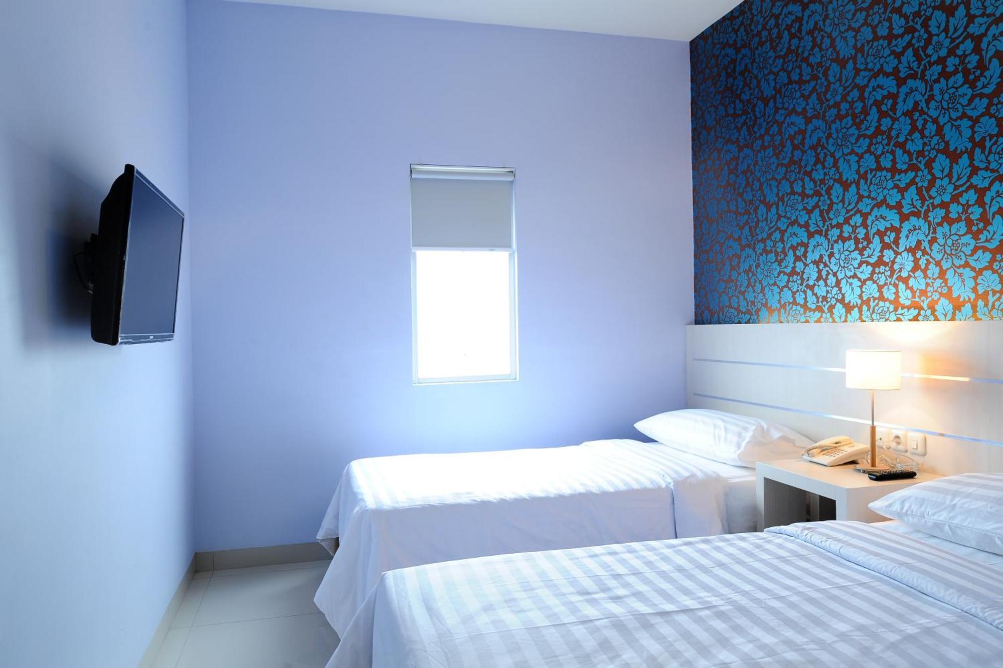 Cordela Hotel Medan Kamer foto